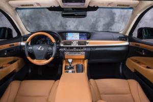No denying the LS's interior is gorgeous, with wood trim and leather seat, plus a wood/leather steering wheel