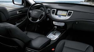 The Genesis R-Spec's interior is stylish with a silver trim line that separates the upper and lower dash.
