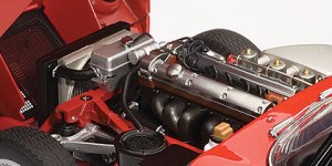 The engine bay is well detailed under the rear-opening hood.