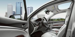 There's more room inside the 2014 MDX, but foot room entering and exiting is tight when the seat is far forward for short drivers.