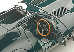 The cockpit is spartan, but you've gotta love the drilled-out 4-spoke wood wheel.