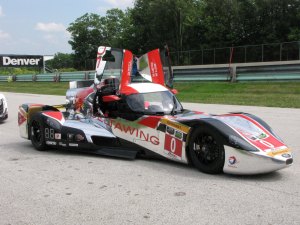 For 2014 the DeltaWing became a coupe with an enclosed cockpit. This is in the pits at Road America.