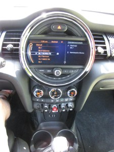 Mid-dash is this round gauge with small radio and nav tuning. Not the easiest to use.