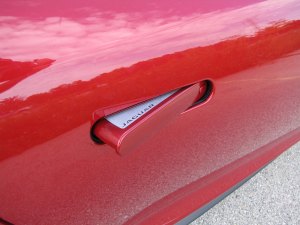 Last but not least, the Jag's door handles pop out when you press "unlock" on the key fob.