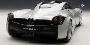 Cool dual tailpipes blend with the roofline's taper.