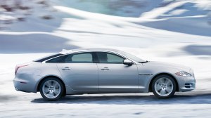 Even in snow this Jag handles like a sports sedan.