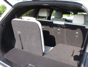 Third row seats allow 6 or 7 folks to ride in Sorento.