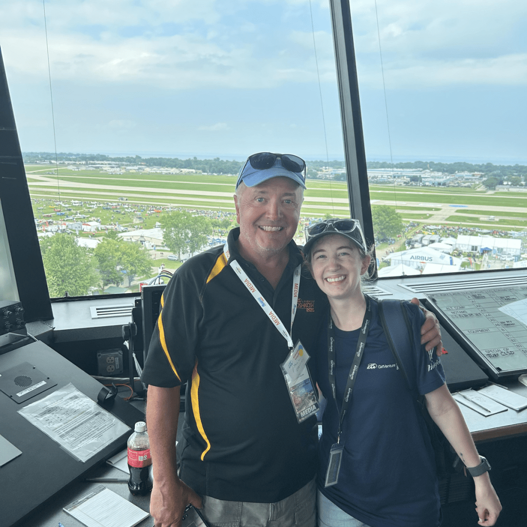 Meg and I are all smiles in the air traffic control tower at EAA AirVenture