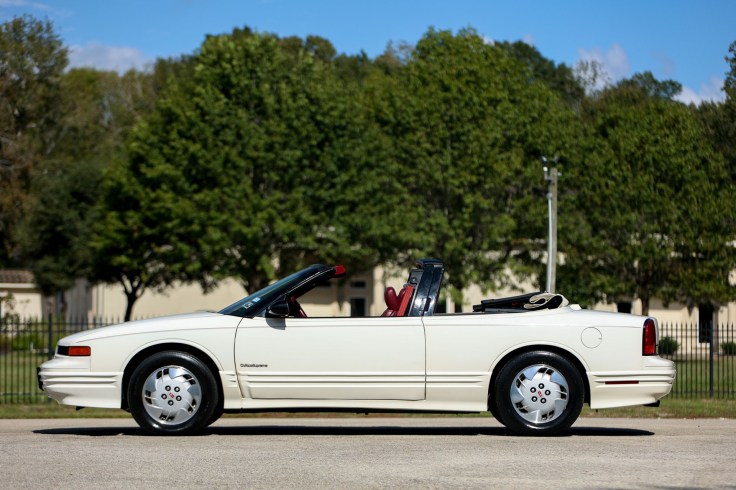93ish Cutlass Supreme Convertible with top down